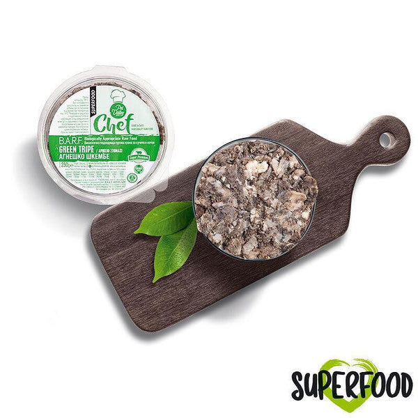 BoneBarf green tripe for dogs in a bowl with fresh leaves, promoting digestive health and natural nutrition.