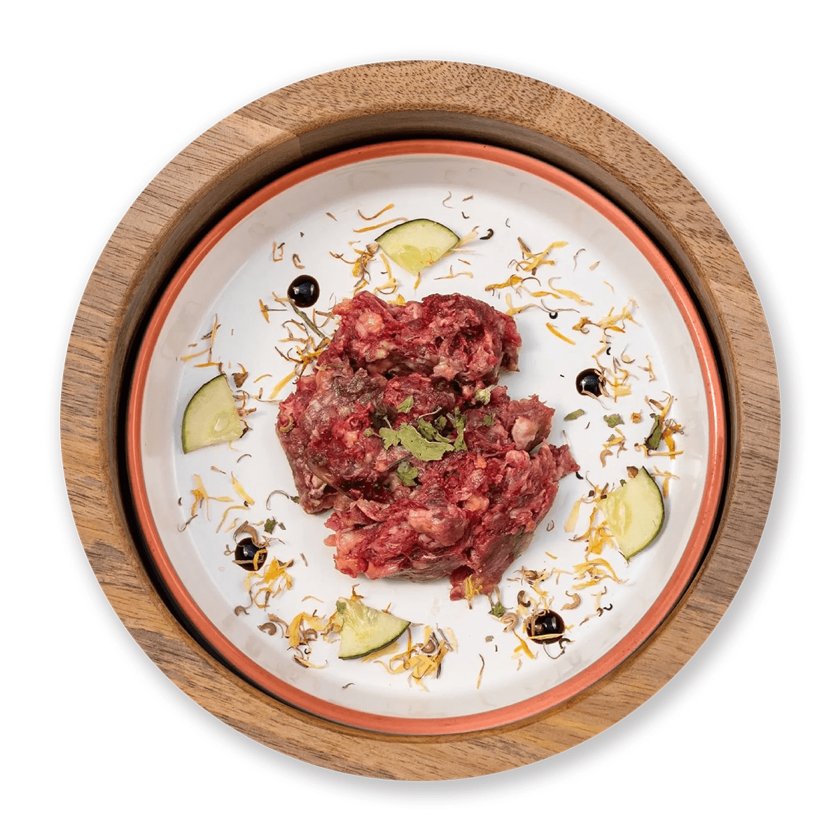 Dottor Fox BARF mix of lamb and rabbit meat served in a wooden bowl with garnish.