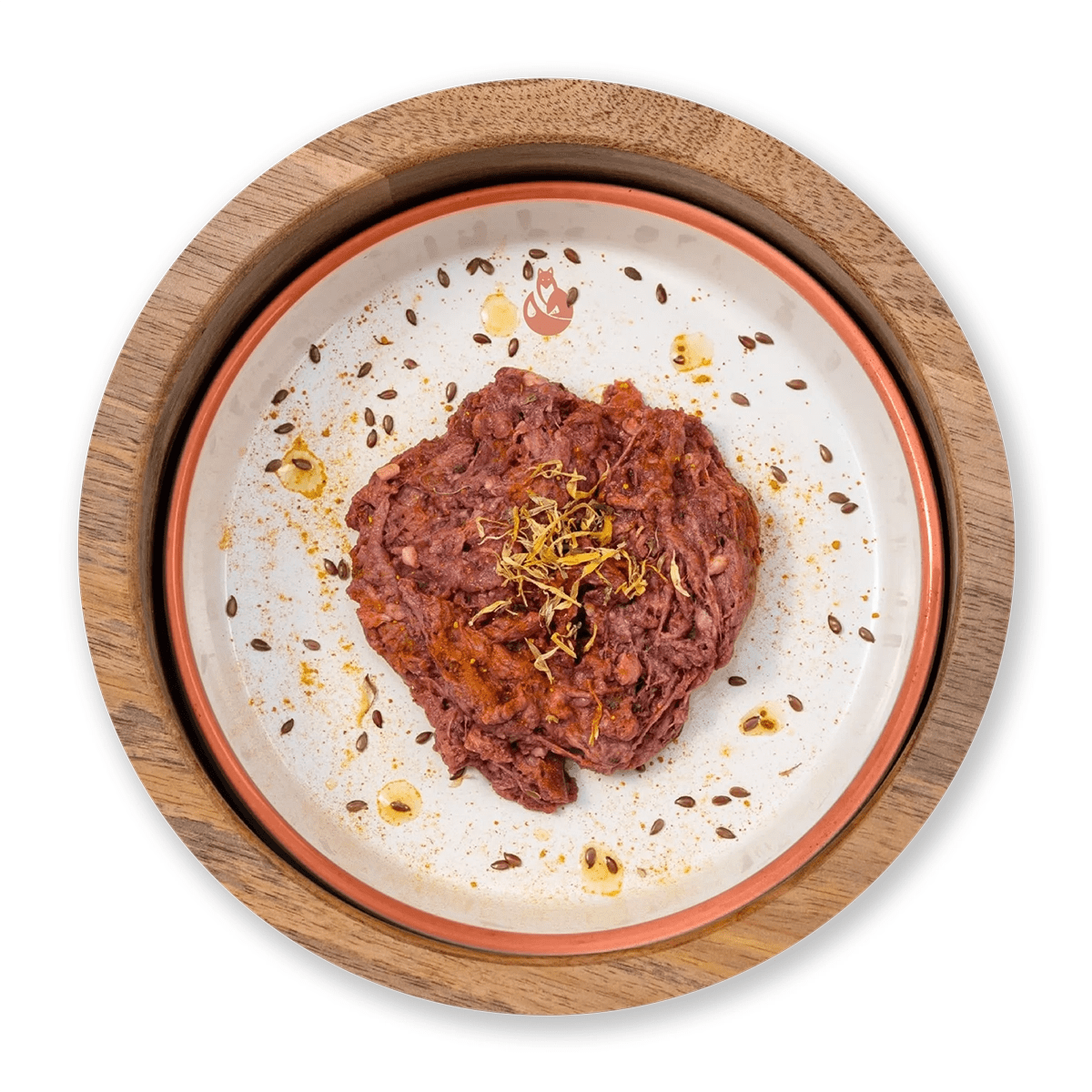 Dottor Fox BARF beef mix served in a wooden bowl with herbs and spices for dogs and cats.