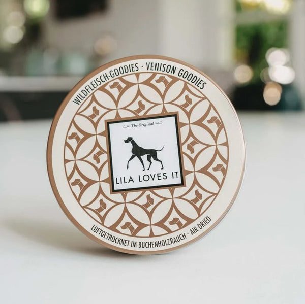 Lila Loves It venison treats packaging featuring a decorative design and logo.